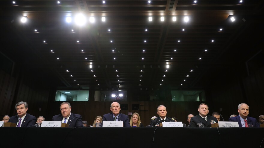 Left to right: FBI Director Christopher Wray, CIA Director Mike Pompeo, Director of National Intelligence Dan Coats, Defense Intelligence Agency Director Lt. Gen. Robert Ashley, NSA Director Adm. Michael Rogers and National Geospatial Intelligence Agency Director Robert Cardillo testify before the Senate intelligence committee on Capitol Hill Tuesday.