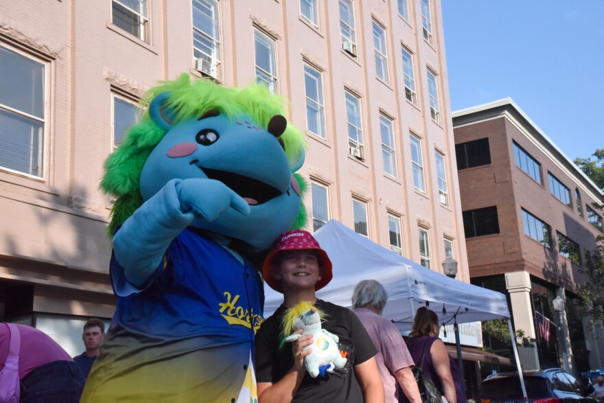Hedgie, Horizon Federal Credit Union’s mascot, posed for pictures alongside 11 year old Drew Stevens from Williamsport. Stevens holds a stuffed version of Hedgie, which he won at the Williamsport credit union’s booth.