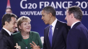 President Obama speaks with (from left) French President Nicolas Sarkozy, German Chancellor Angela Merkel and British Prime Minister David Cameron at the G-20 summit in Cannes, France, on Thursday. The talks were dominated by Greece's financial woes. 