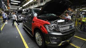 A 2018 Ford Expedition goes through the assembly line at a Ford plant Oct. 27, in Louisville, Ky. Higher-profit SUVs and trucks are making up a larger share of auto sales, boosting the industry's fortunes.