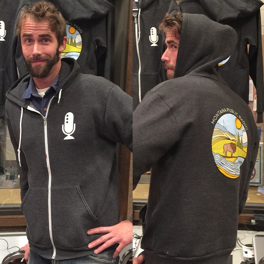 MTPR's Beau Baker shows off this year's sweatshirt, yours for a donation of $20/month.