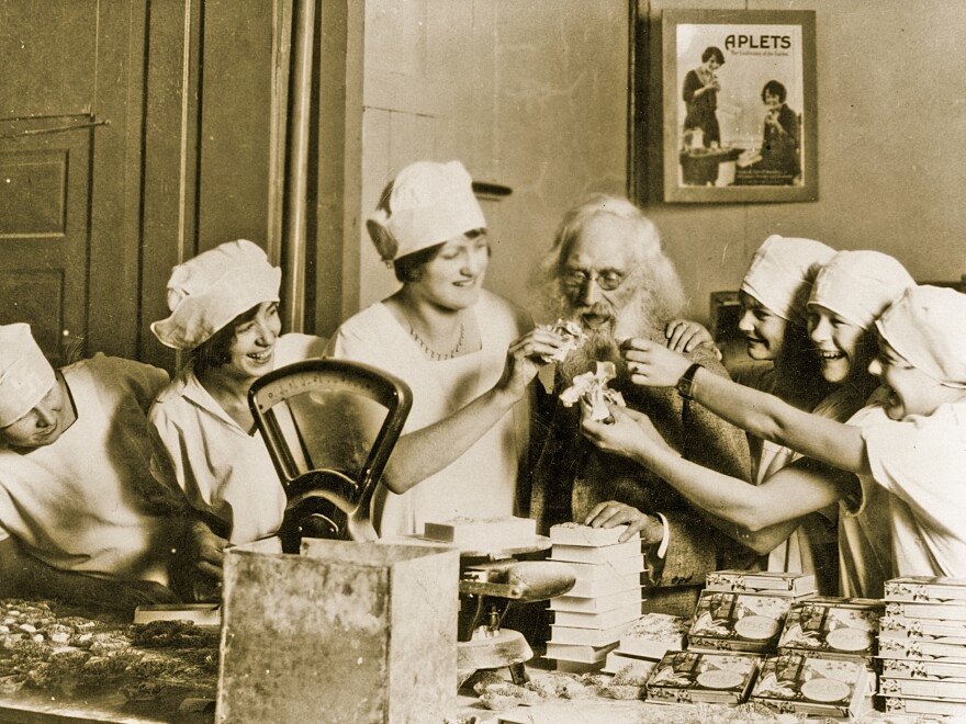 Liberty Orchards' employees share their treats with Ezra Meeker, one of Washington state's original pioneers.