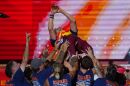 Spain's head football coach, Luis de la Fuente, is carried aloft by his players during celebrations at Cibeles Square in Madrid on Monday, July 20, 2026, after Spain defeated Argentina in the World Cup final in East Rutherford, N.J., near New York. (AP Photo/Manu Fernandez)