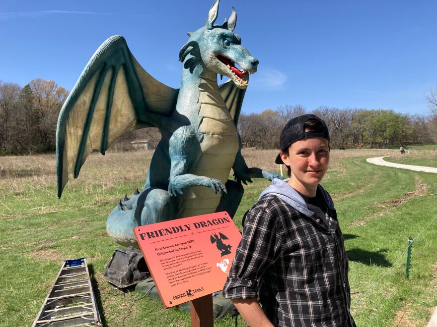 Dragon installer and repair technician, Reba Hull, poses with the Friendly Dragon at the Heard Museum in McKinney. 