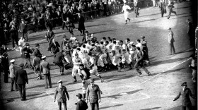 The Cincinnati Reds rush the field after winning the 1940 World Series championship against the Detroit Tigers on Oct. 8, 1940 in their hometown.