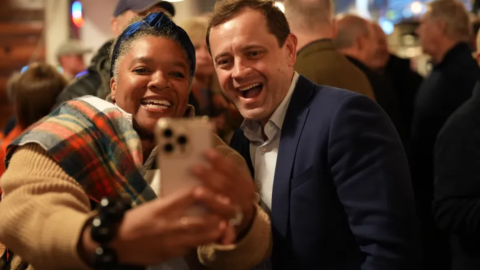 Congressional candidate Tom Perriello poses with a supporter