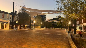 College Square, which re-opened in 2026 as a permanent pedestrian space, tree-lined with brick pavers and shade canopies.