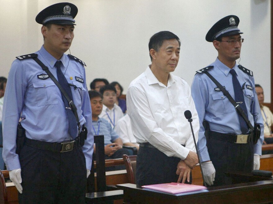 Bo Xilai, in white shirt, on Thursday during his trial on corruption charges at the Jinan Intermediate People's Court in China's Shandong Province.