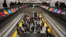 People walk about the newly opened Second Ave. Subway 86th Street station in New York Sunday, Jan. 1, 2017. (Craig Ruttle/AP)