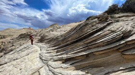 A hiker at the Grand Staircase-Escalante Monument. Photo by Stephen Trimble.