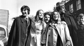 6th October 1967: California based pop-folk vocal harmony group Mamas And The Papas in England, celebrating after theft charges were dropped against 'Mama' Cass Elliot who was accused of stealing blankets and keys from the Royal Garden Hotel in Kensington on an earlier visit. From left to right, Denny Doherty, Michelle Gilliam (Michelle Philips), unknown, 'Mama' Cass Elliot (1943 - 1974) and John Phillips (1935 - 2001). (Photo by Les Lee/Express/Getty Images)