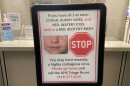 A sign about measles at the UMass health clinic.