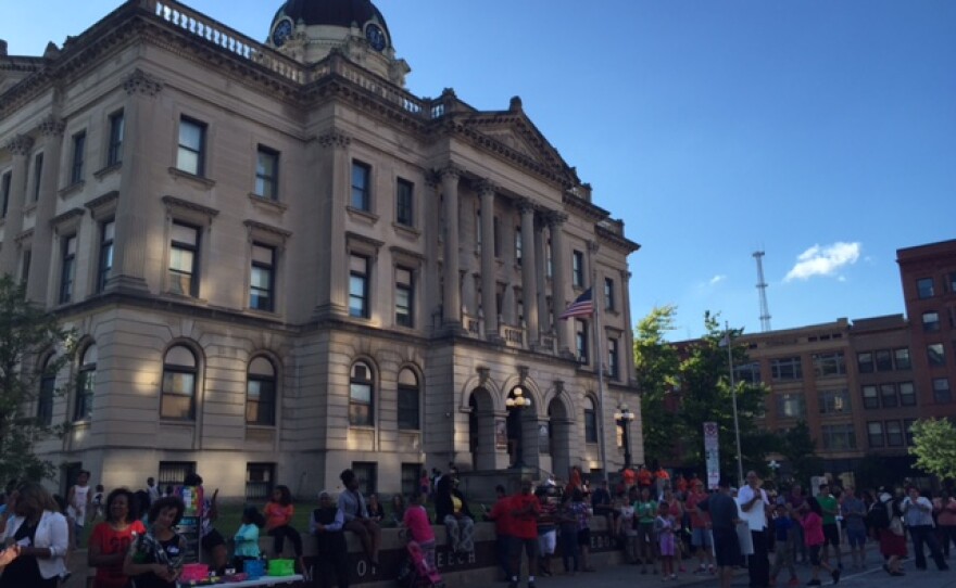 Crowd in front of old courthosue