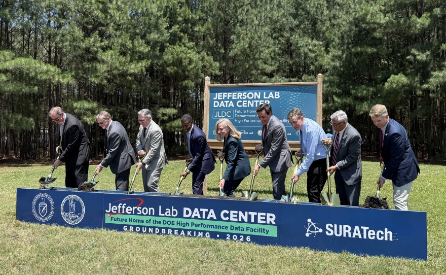 Jens Dilling with the Jefferson Lab (L), Sean Hearne with SURA, Virginia Tech PresidentTim Sands, Newport News Mayor Philip Jones, Gov. Abigail Spanberger, DOE Under Secretary for Science Darío Gil, Sen. Mark Warner, Rep. Bobby Scott and Rep. Rob Wittman break ground of the future Jefferson Lab Data Center and High Performance Data Facility, Friday, June 12.