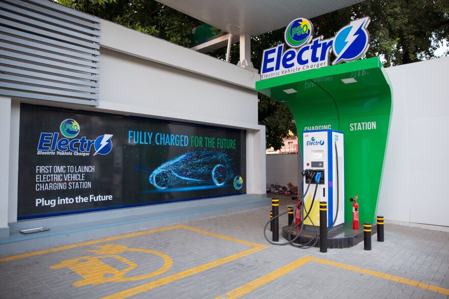 An electric car charging station installed at a local gas station in Islamabad. The government's new electric vehicle policy aims to lessen Pakistan's terrible air pollution, and it reduces taxes on imported parts to incentivize sales. It covers motorbikes, rickshaws, buses and trucks, vehicles which dominate the road in Pakistan, but cars are exempt.