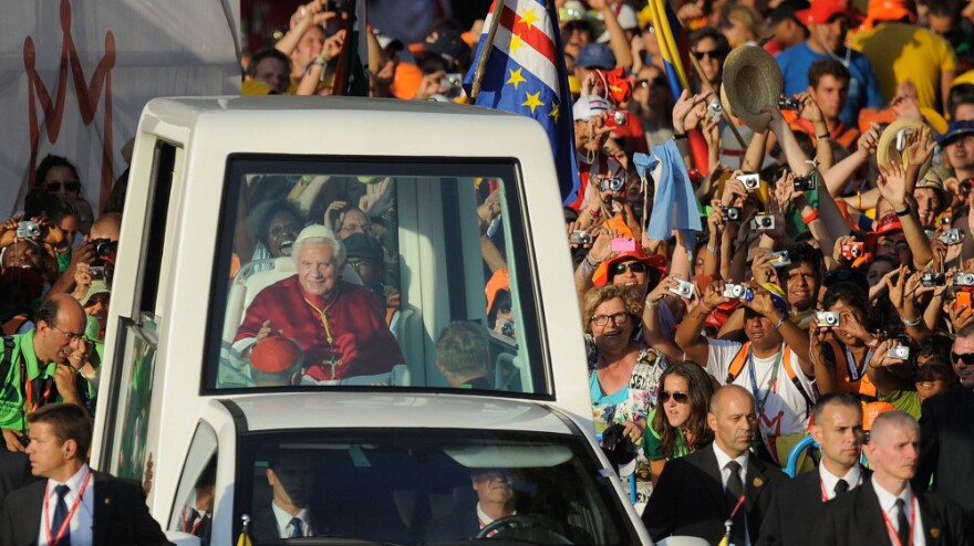 Young Catholics welcome Pope Benedict XVI as he arrives at Cibeles Square during World Youth Day celebrations on Aug. 18, in Madrid.