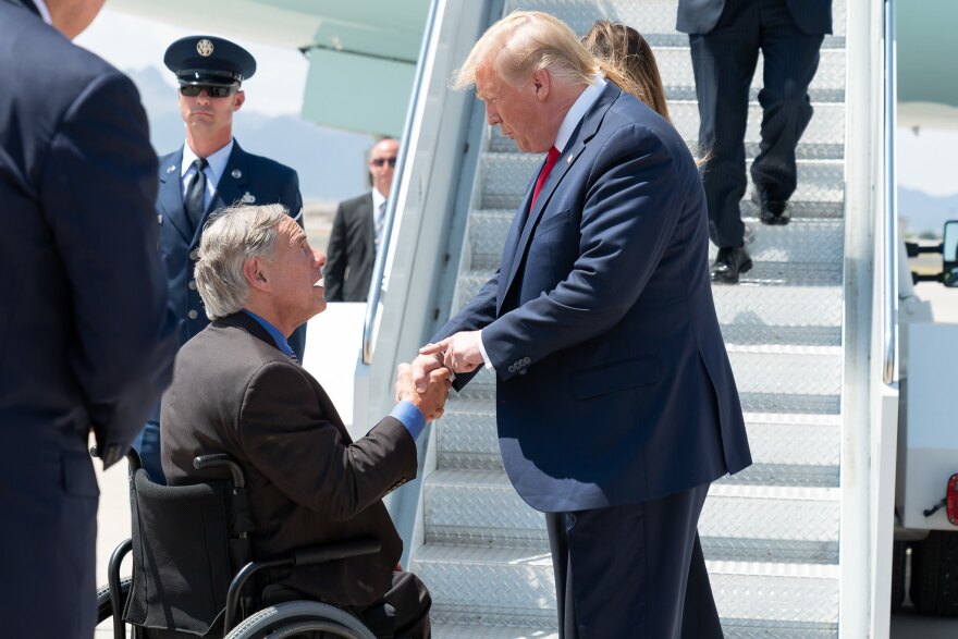 Greg Abbott and former President Trump arriving at El Paso International Airport in 2019.