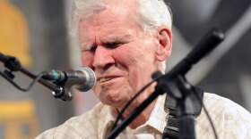 Doc Watson performs at the 2009 New Orleans Jazz & Heritage Festival on May 1, 2009.
