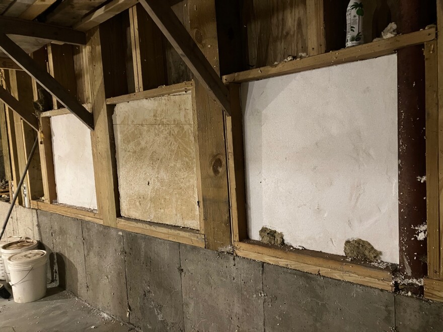 Three windows in Kent Hicks' basement in West Chesterfield, Massachusetts are designed to open in a flood, with the goal of allowing water to enter the house -- and then rise and fall with the floodwaters outside. The idea is to equalize  the water pressure so floodwaters don't lift the house and carry it away.