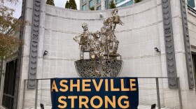 An 'Asheville Strong' banner in downtown Asheville on December 3, 2024.