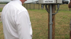 Mayor Bartlett with circuit control box for highway lights