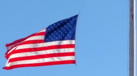 U.S. flag is flying at half staff