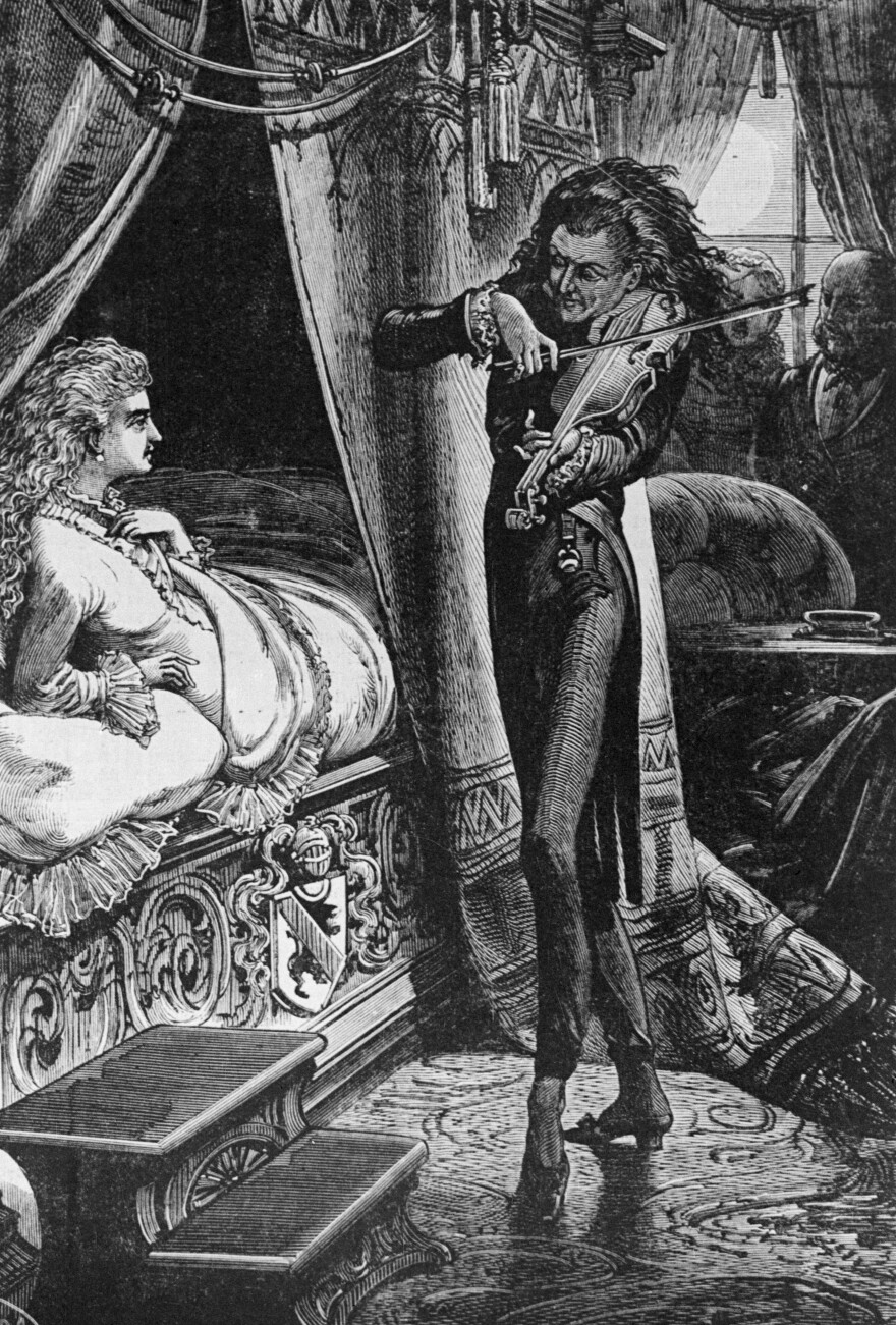 Niccolo Paganini shown spellbinding a young English lady with his music, in an etching from 1900.