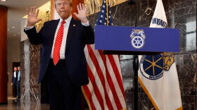 Republican presidential candidate and former U.S. President Donald Trump holds up his hands after being asked about them by reporters at the International Brotherhood of Teamsters headquarters in Washington, DC.