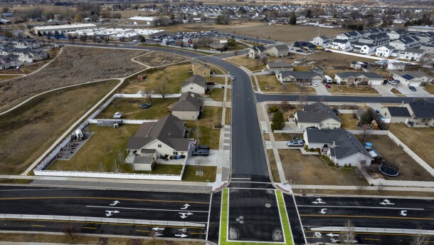 A drone shot of a city intersection.