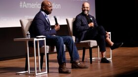 Aaron Bryant, Curator of Photography, Visual Culture, and Contemporary History and Jeffrey Wright speak onstage during the AMERICAN FICTION screening at Oprah Winfrey Theater at the Smithsonian Museum of African American History and Culture.
