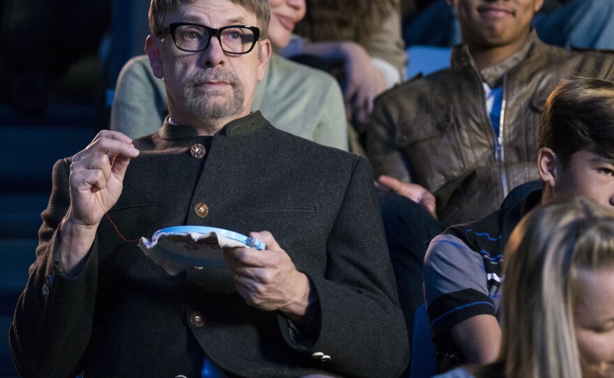 In <em>Mascots</em>, Christopher Guest reprises his role as Corky St. Clair from <em>Waiting for Guffman</em>.