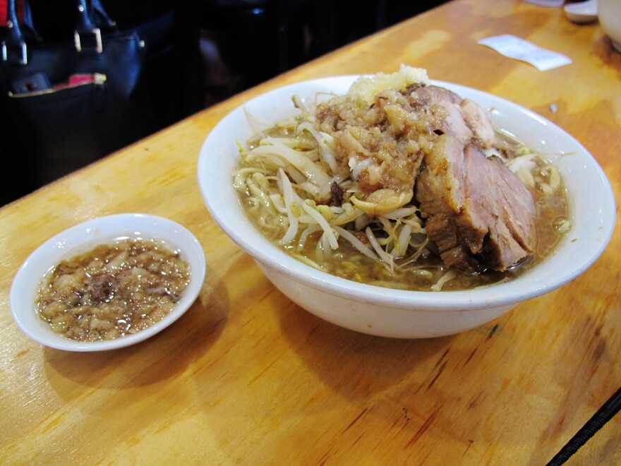 There are two choices at Yume Wo Katare: ramen topped with pork ($12), or ramen topped with more pork ($14). Extra garlic and fat can be added, too.