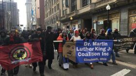 MLK marchers in 2020. This year they will be socially distanced or riding in buses or cars.