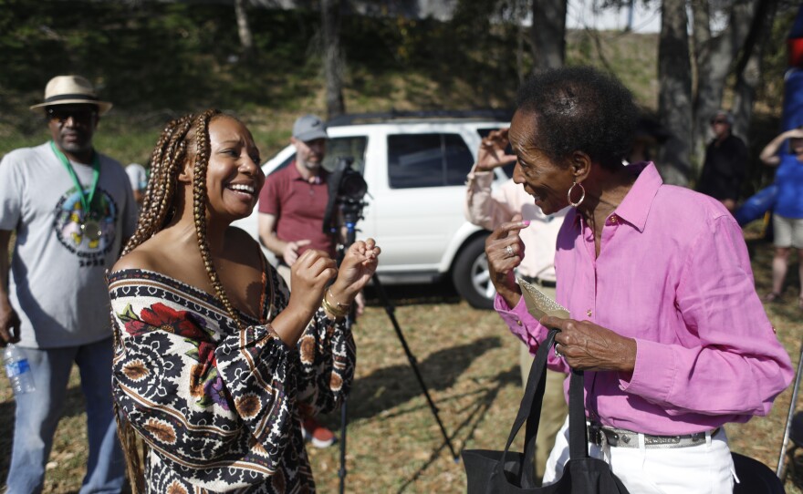 Gabrielle E. W. Carter greet festival attendees during the 2022 Publix Tampa Bay Collard Festival in St. Petersburg, Florida, on Saturday, February 19, 2022. Photo by Octavio Jones for WUSF