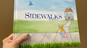 The cover of Sidewalks, a children's book by local educator, Dr. Chris Simrell.
