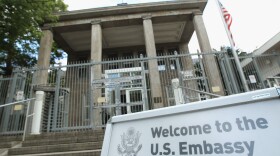 A sign stands outside the U.S. embassy following the sudden illness of three embassy staff in Berlin, Germany. (Sean Gallup/Getty Images)