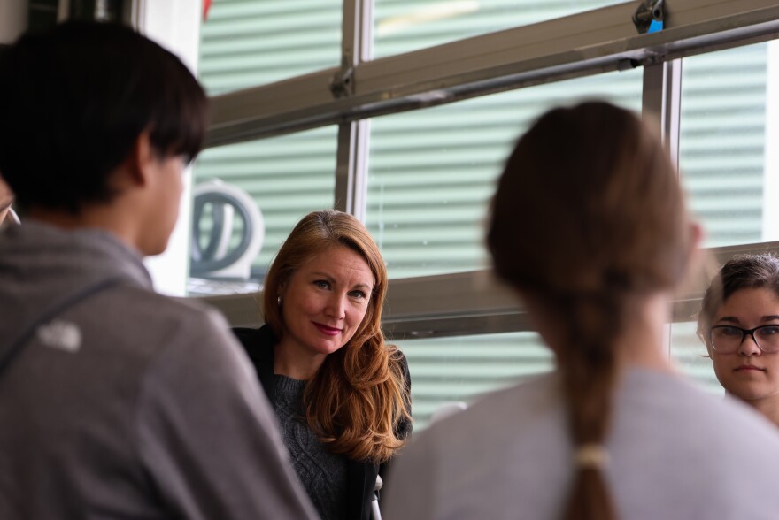 Rep. Stansbury speaks with a group of students during Saturday's summit