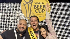 From left to right, Darlyn Victor, Tripp Allen, and Ana Rodriguez de Vera (the queen), at the World Beer Cup finalist ceremony at the