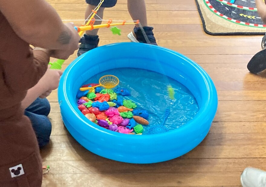 Children at the Archway Academy in Northport play "One Fish, Two Fish, Red Fish, Blue Fish"