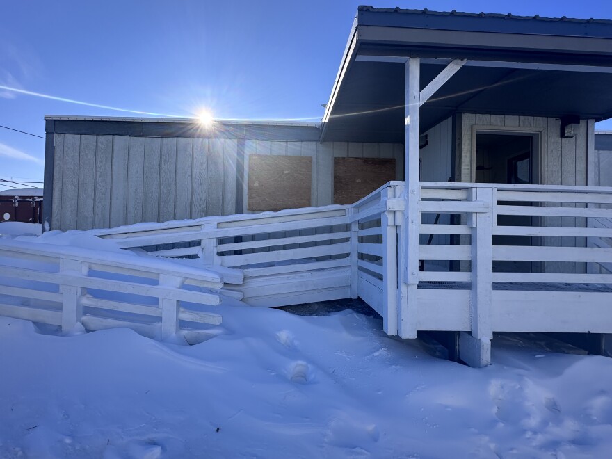 Plywood covers windows at the Kotzebue Police Department building.