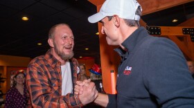 Republican congressman-elect Rob Bresnahan, right, accepts congratulations Tuesday evening from supporter Jeff Labrosky, owner of Labrosky's Automotive Service Center in Scranton. Bresnahan celebrated his defeat of Democratic U.S. Rep. Matt Cartwright at Sabatini's Bottle Shop & Bar in Exeter.