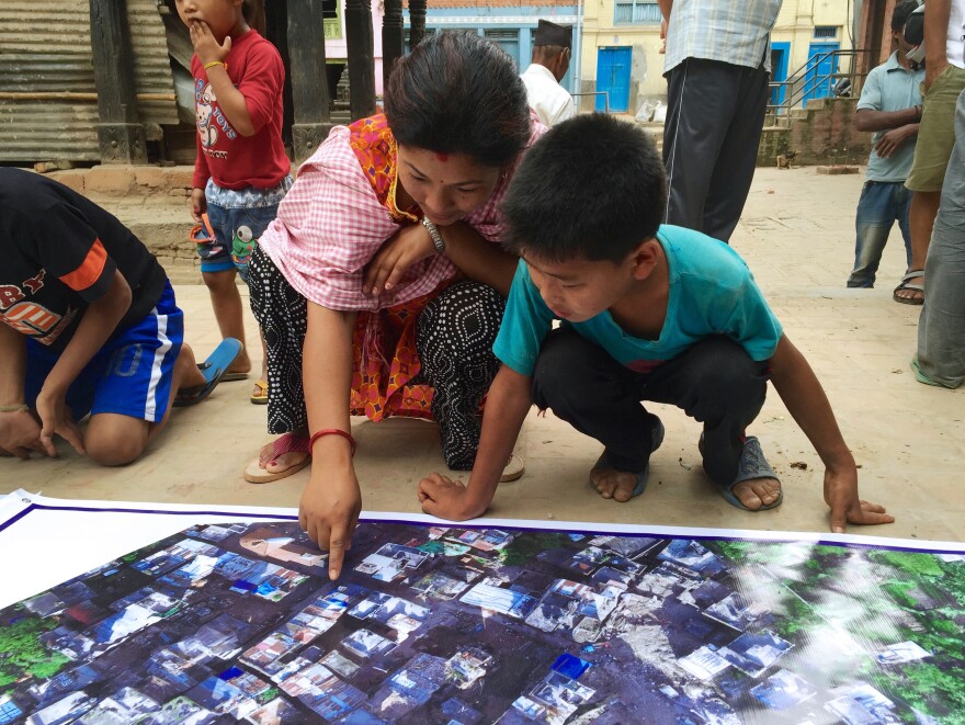 In Nepal, Meier printed out banners showing high-resolution maps from stitched-together drone images. People in Panga, near Kathmandu, had the opportunity to annotate the maps with additional information and fill in blank spots.