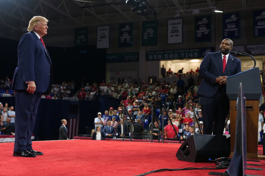 Florida gubernatorial candidate Rep. Byron Donalds, R-Fla., speaks at a campaign rally with President Donald Trump at Alico Arena on the campus of Florida Gulf Coast University, Friday, Oct. 23, 2026, in Fort Myers, Fla. (AP Photo/Mark Schiefelbein)
