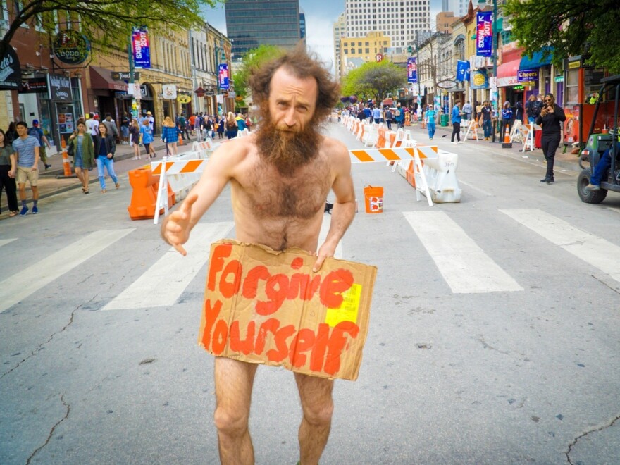 A man sought to impart spiritual advice to Bob Boilen during SXSW in Austin.