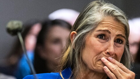 Former Colorado Bureau of Investigation forensic analyst Yvonne "Missy" Woods crying in court.