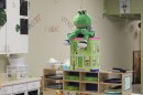 A stuffed frog sits on top of a cubbie at The Center, a child care center in Pittsburg, Kansas. 