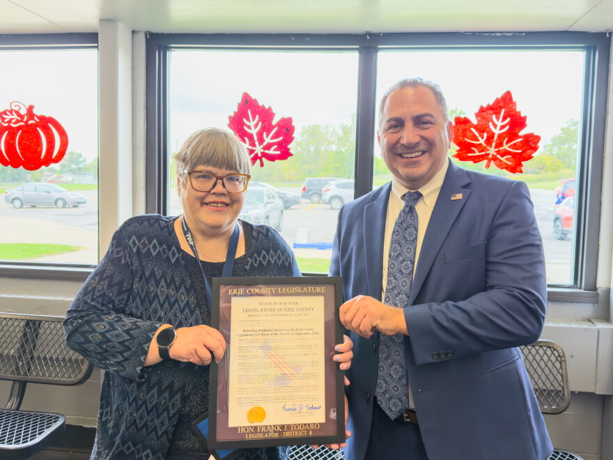 Stephanie Speaker, left, receives September's Erie County Citizen of the Month Award from Erie County Legislator Frank Todaro at the Depew Ice Pavilion on Tuesday, Sept. 29, 2026.