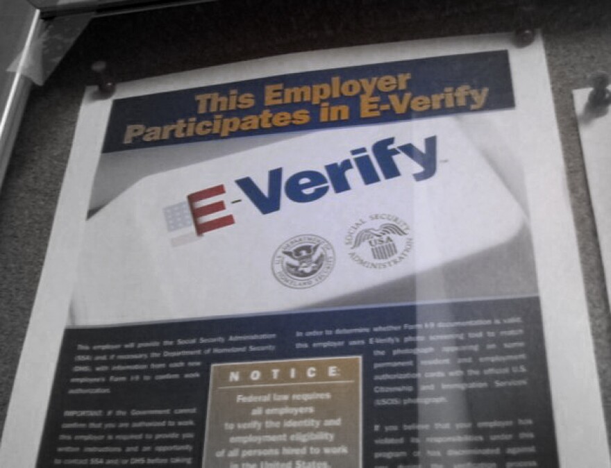 Employers that use E-Verify in the hiring process display a sign in their office.