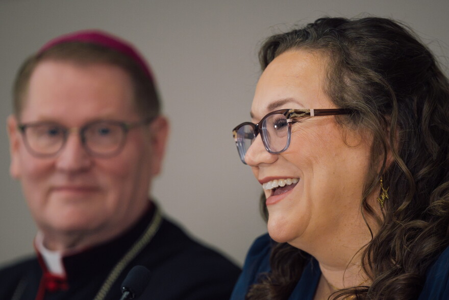 Bonnie Engstrom reacts while speaking during a news conference ahead of the beatification Mass for the late Archbishop Fulton J. Sheen on Thursday at the Dome at America's Center in downtown St. Louis. Engstrom recalled watching Sheen on television while growing up. "He reminded me of spending time with my great-grandpa," she said. "The wisdom and the humor and the personality — it was such a warm character, and I knew that was a man that I wanted to get to know better."