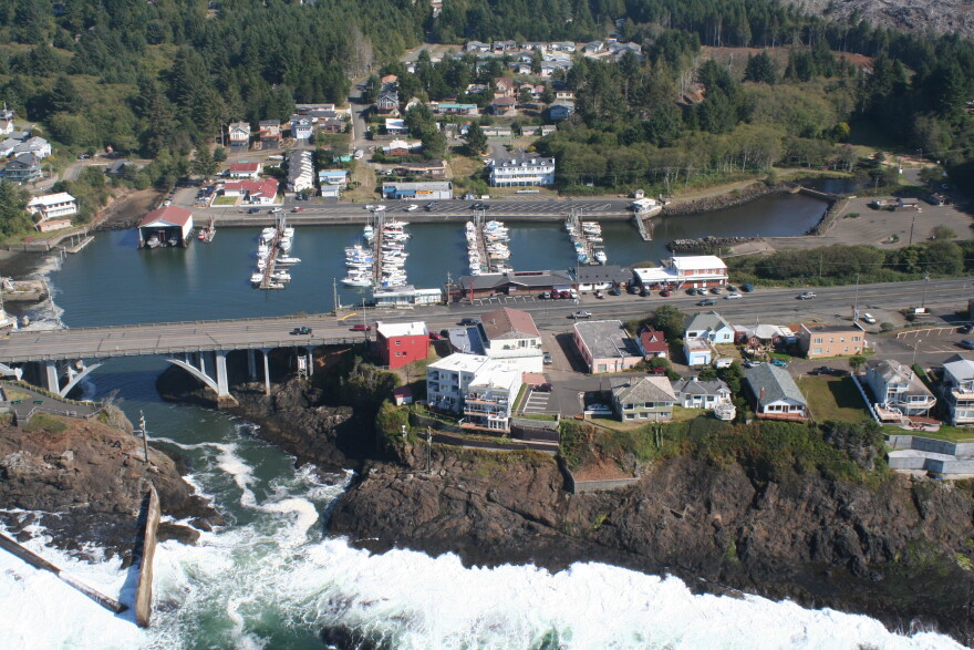 City leaders in Depoe Bay are anxiously awaiting word if silt accumulating at the south side (image right) of their harbor will be dredged in 2019.